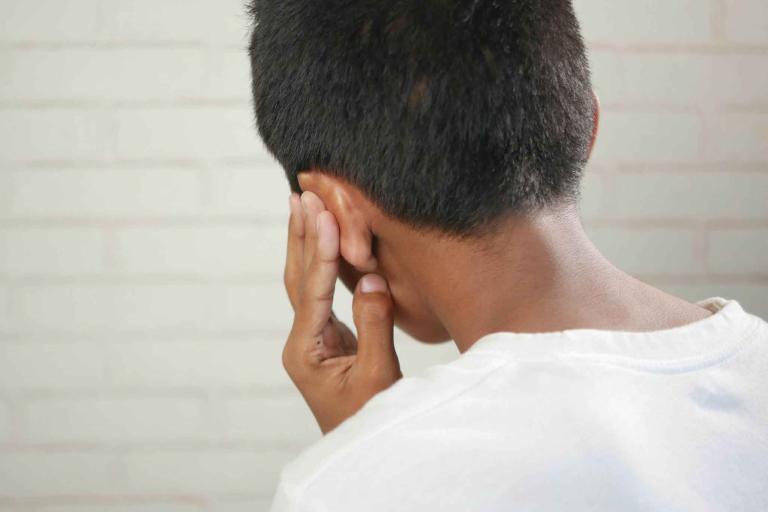 Child with cold and clogged ears