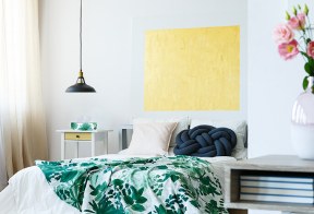 Picture of bedroom essentials with a box of Kleenex tissues