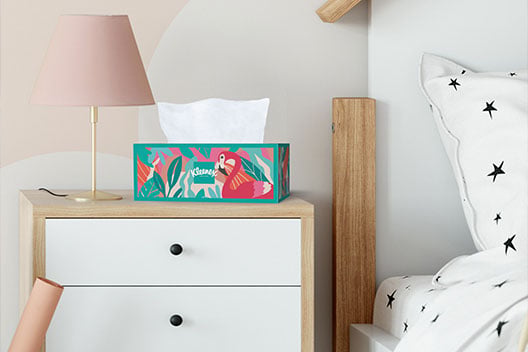 Kleenex® Trusted Care® Tissues Rectangle Box in reach on a bedside table 